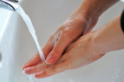 Washing Hands At Sink