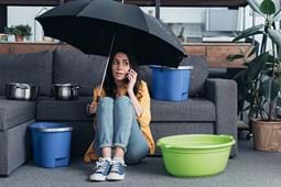 Woman Sitting With Basins Umbrella 800
